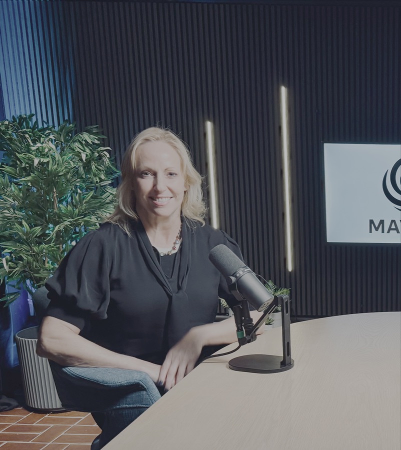 Paula in a podcast studio